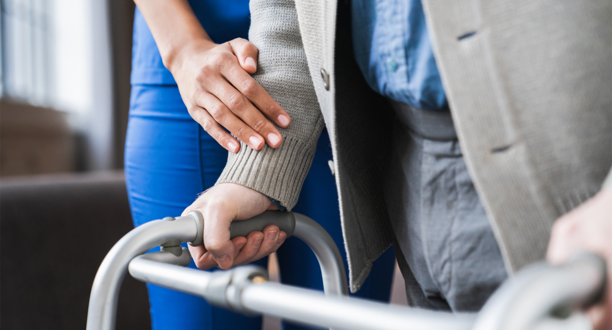 Elderly patient using a walker